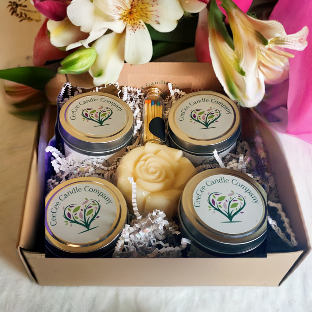 set of soy candles sitting in gift box